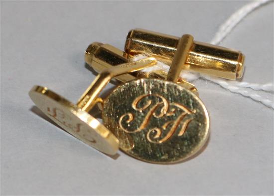 A pair of 18ct gold cufflinks engraved with initials PF,